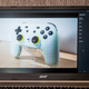 A photo of the Chromebook 317 opened with Lightroom Mobile on its screen